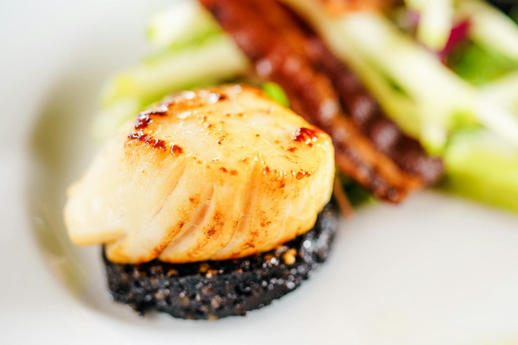 Boudin noir et transit effets — plat de boudin noir avec légumes